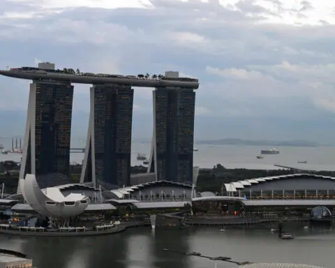 Singapore keeps monetary policy steady as Q3 growth picks up; analysts bet on Jan easing
