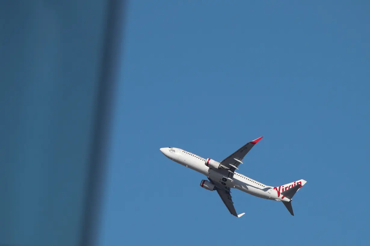 FILE PHOTO: A Virgin Australia Airlines plane takes off from Kingsford Smith International Airport in Sydney