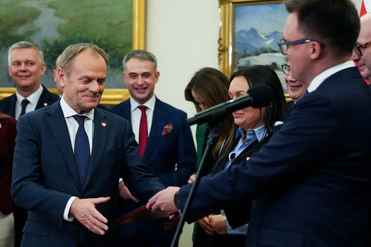 FILE PHOTO: Newly appointed Polish PM Tusk wins the vote of confidence for his government, in Parliament, in Warsaw