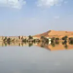 Striking images show rare floods in the largest hot desert on Earth