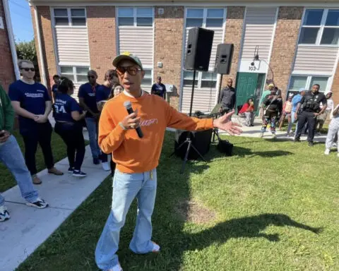 Pharrell makes surprise stop at LEGO and sneaker giveaway in former neighborhood