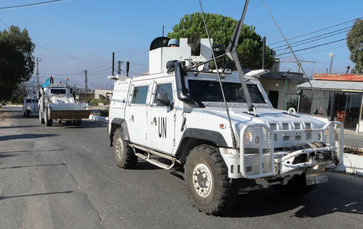 UN peacekeepers (UNIFIL) vehicles drive in Marjayoun