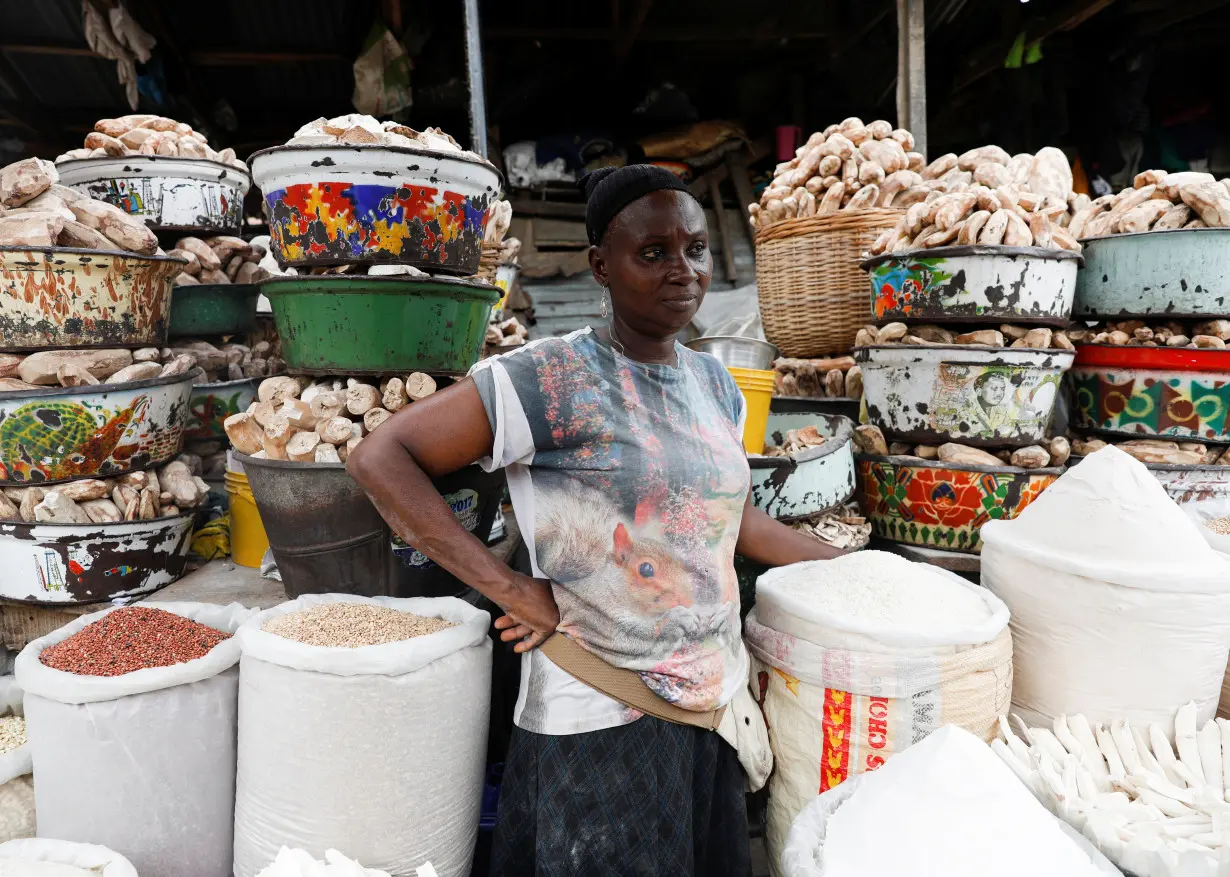 FILE PHOTO: A vendor looks on as she awaits customers at her stall in Mile 12 International Market in Lagos