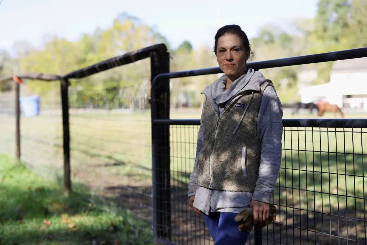 Erika Worobec, who successfully sued to compel local officials to notify voters if their mail-in or absentee ballot had a clerical error, poses at home in Cecil