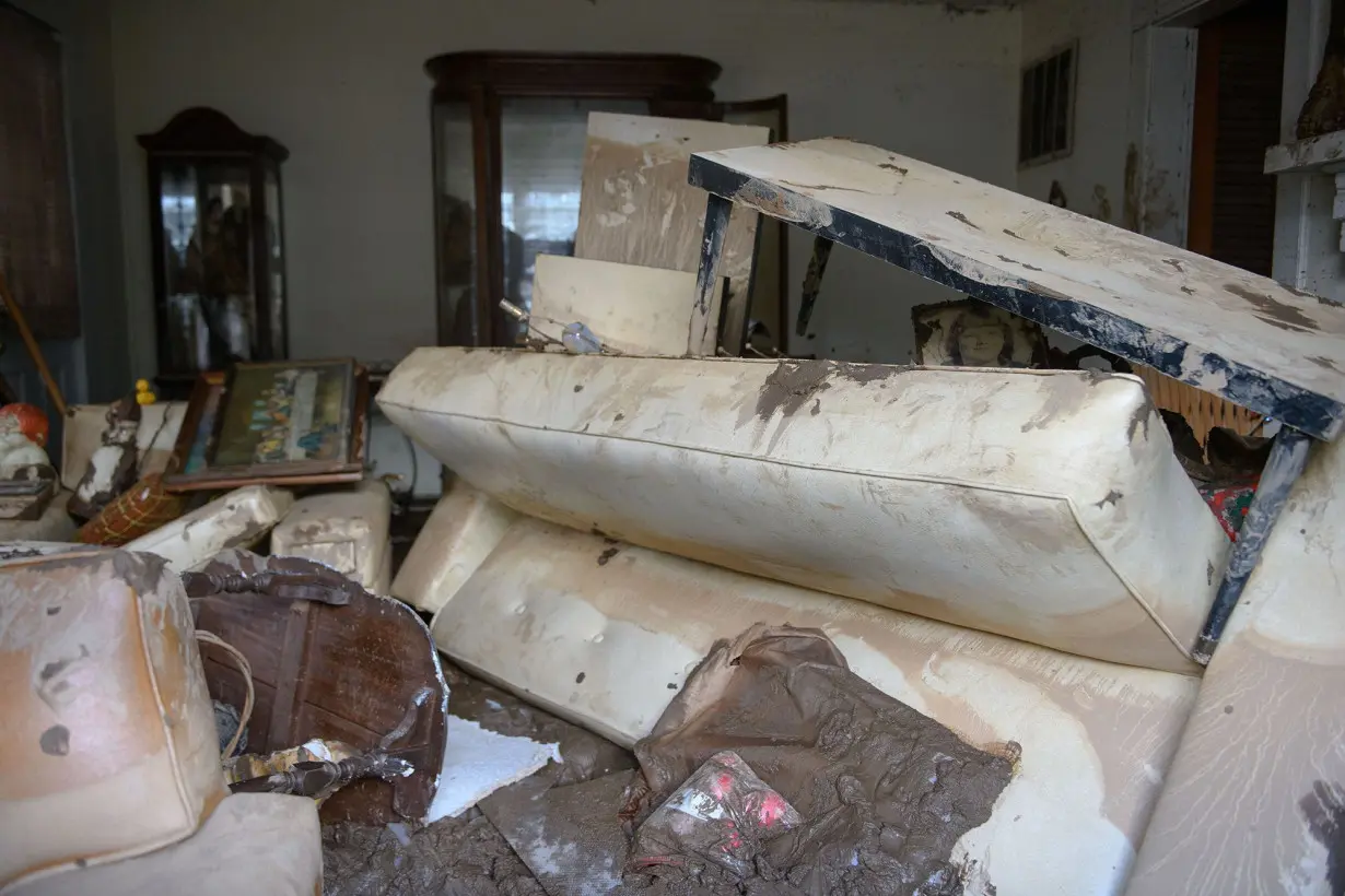 Residents' belongings are seen in a flooded home on October 2, in Swannanoa, North Carolina.