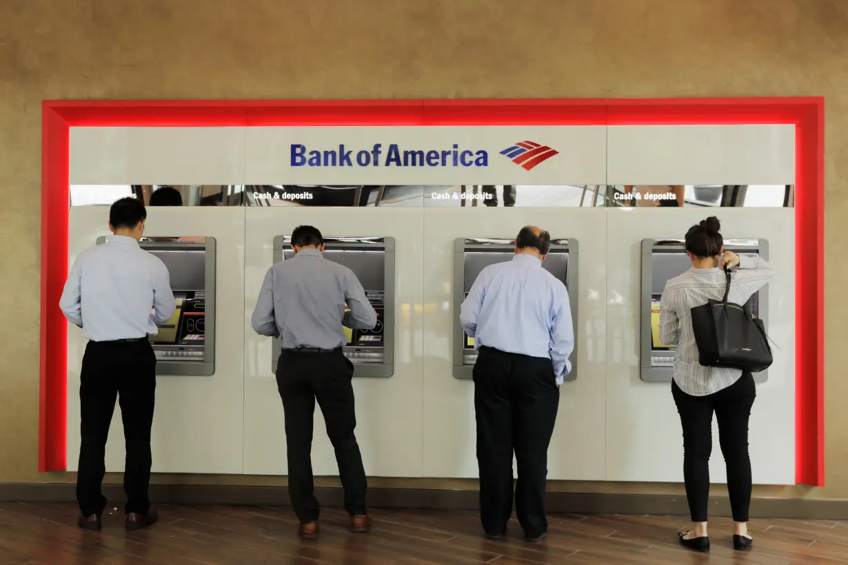 People withdraw money from Bank of America ATMs in New York