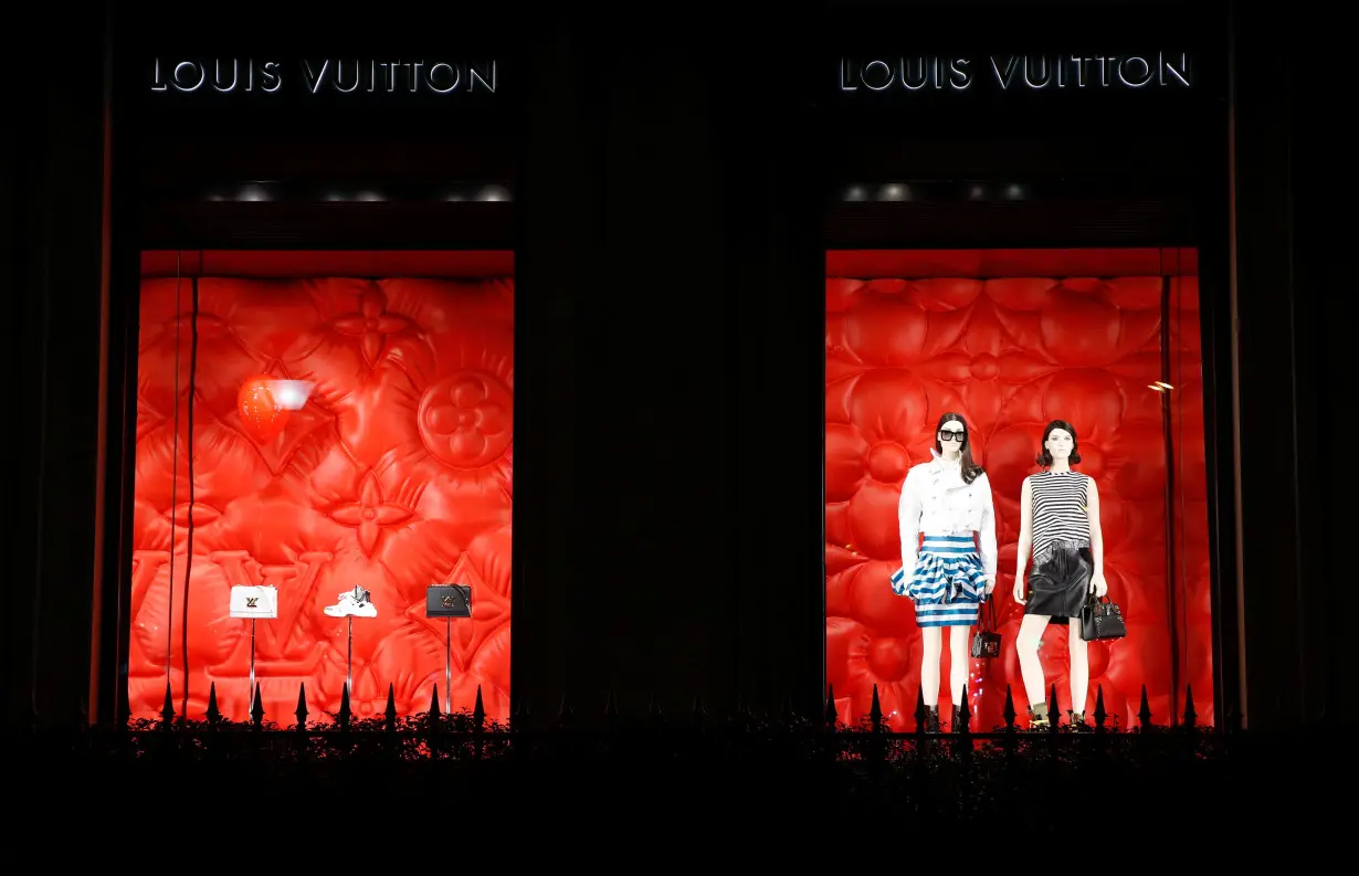 Louis Vuitton logo brad is seen outside a Louis Vuitton store in Paris