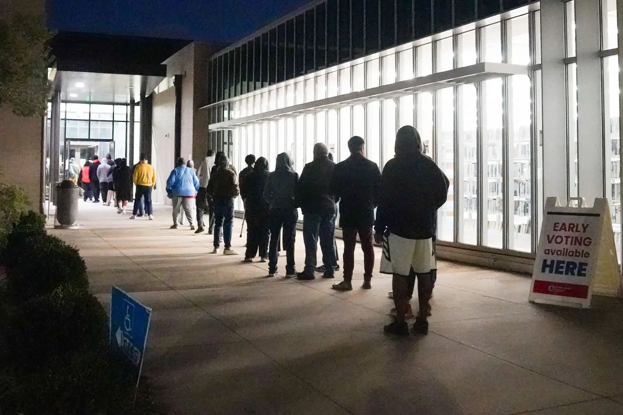 Record number of early votes cast in Georgia as election gets underway in battleground state