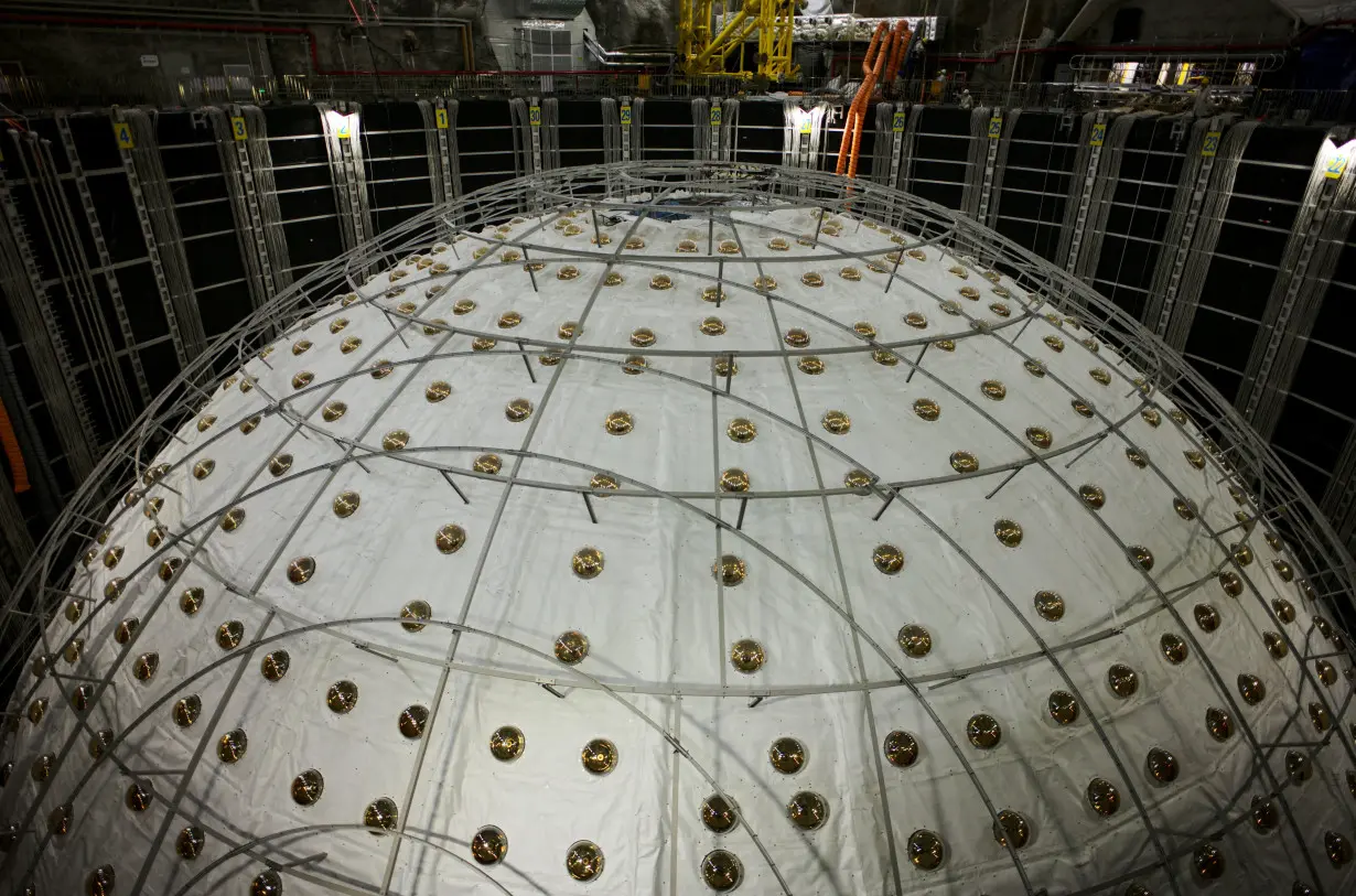 FILE PHOTO: A view of the soon-to-be-completed and sealed central detector at the Jiangmen Underground Neutrino Observatory (JUNO), in Kaiping