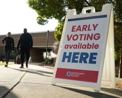 Judge pauses rule that would require Georgia counties to hand-count ballots