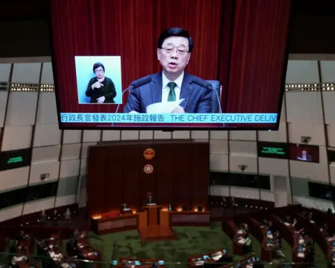 Hong Kong pushes reforms to spark economic growth, cut liquor duties