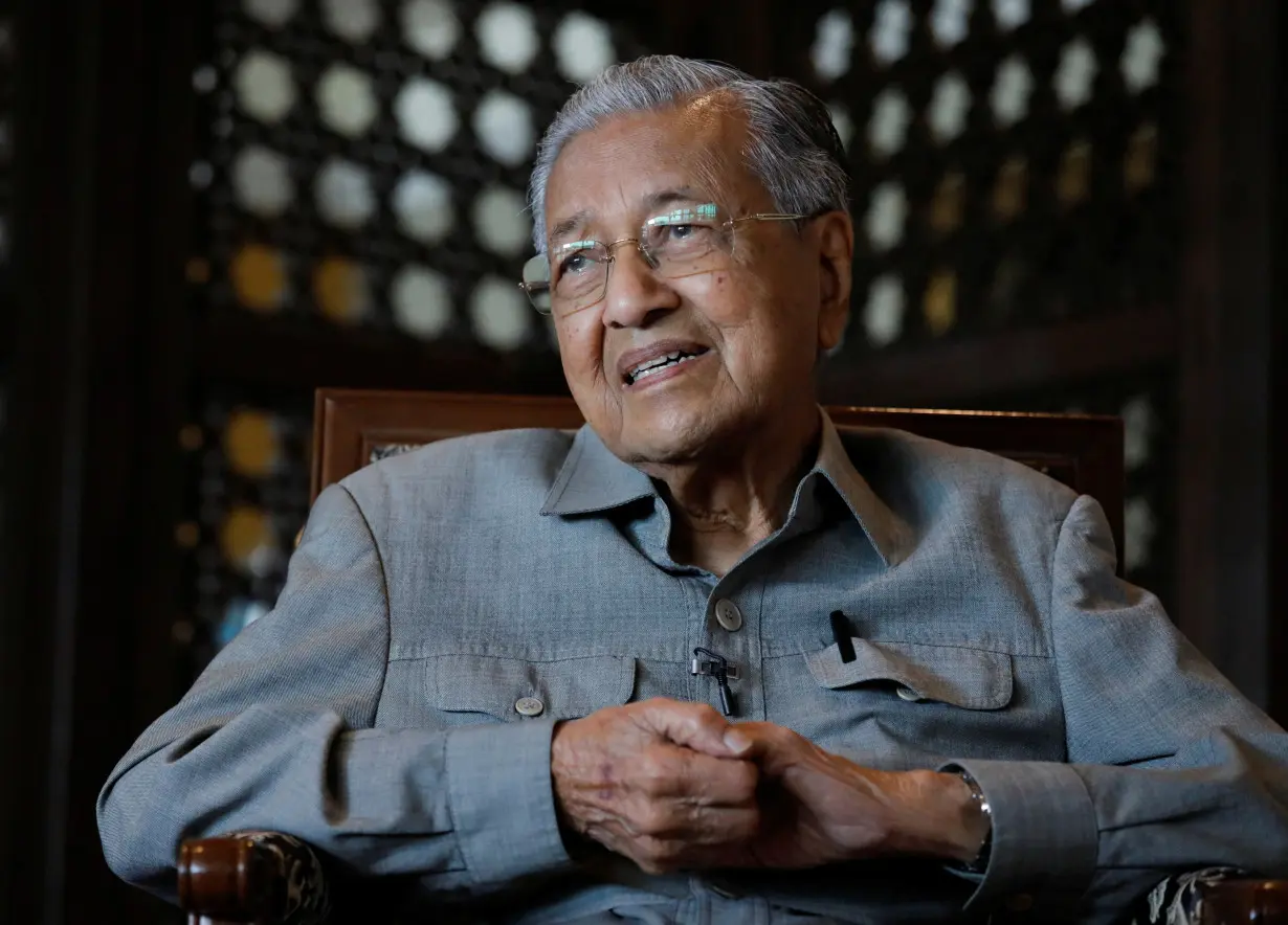 Former Malaysian Prime Minister Mahathir Mohamad speaks during an interview in Putrajaya