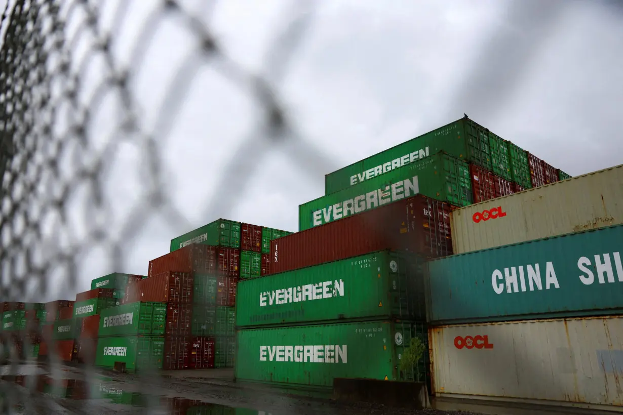 FILE PHOTO: Containers are seen stacked in Portsmouth Marine Terminal (PMT) in Portsmouth