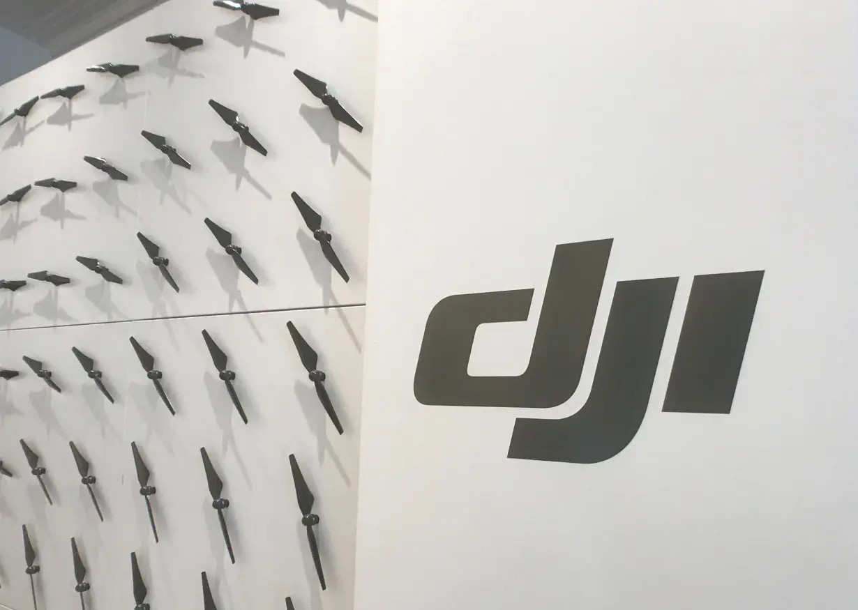 The logo of Chinese drone maker DJI is seen at the company's office in New York