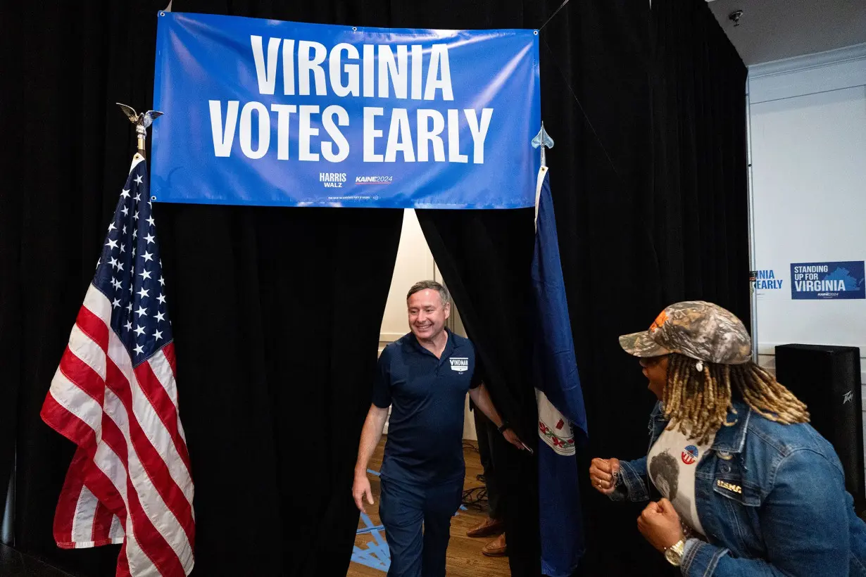 Democratic Congressional candidate Eugene Vindman walks to the stage to speak during the Virginia Democrats' first day of early voting rally in Manassas, Virginia, on September 20.