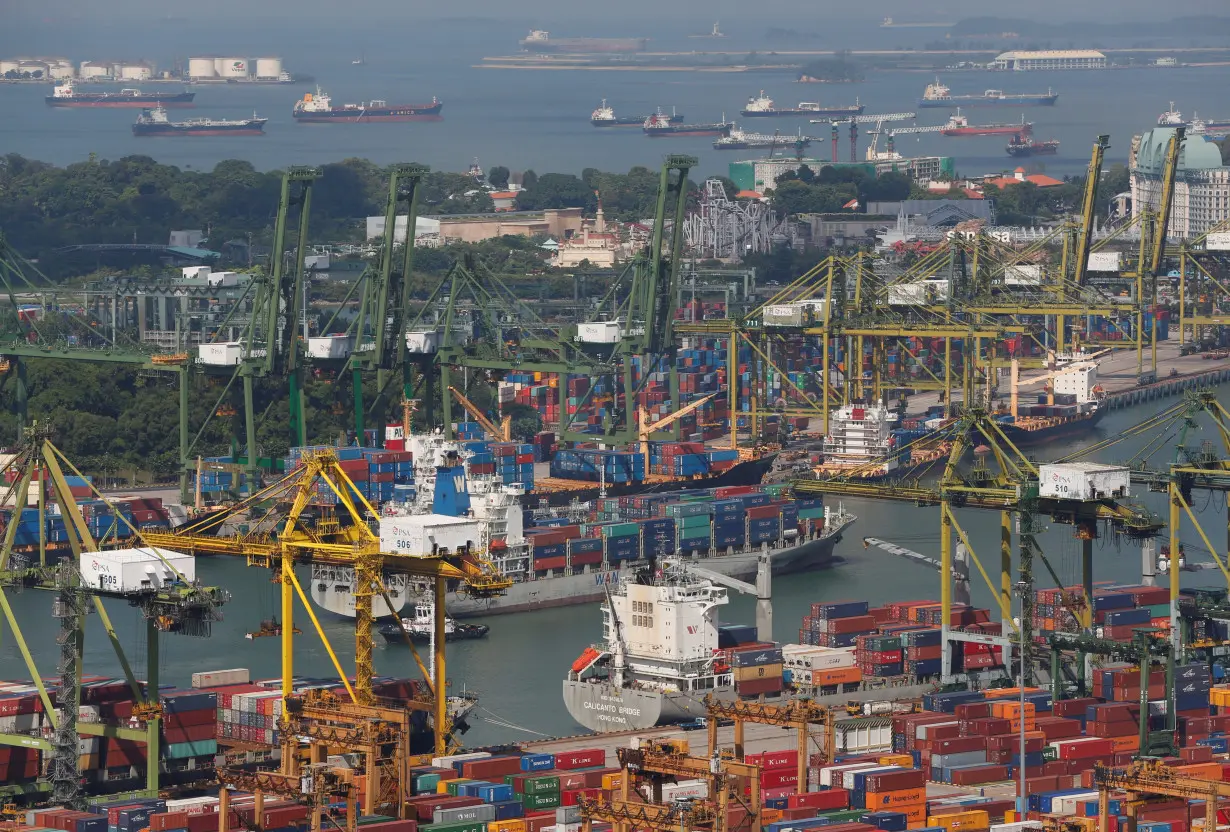 A container ship arrives in a port in Singapore