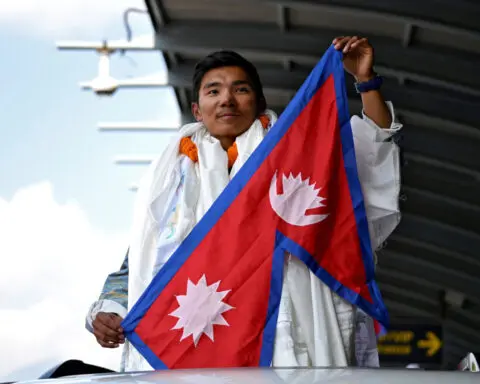 Nepal's Sherpas deserve more, says teenager who scaled world's 14 tallest peaks