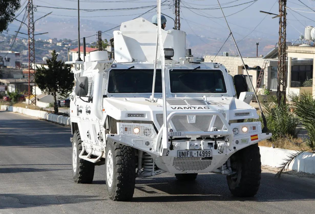 A UN peacekeepers (UNIFIL) vehicle drives in Marjayoun