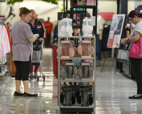 US shoppers spent more at retailers last month in latest sign consumers are driving growth