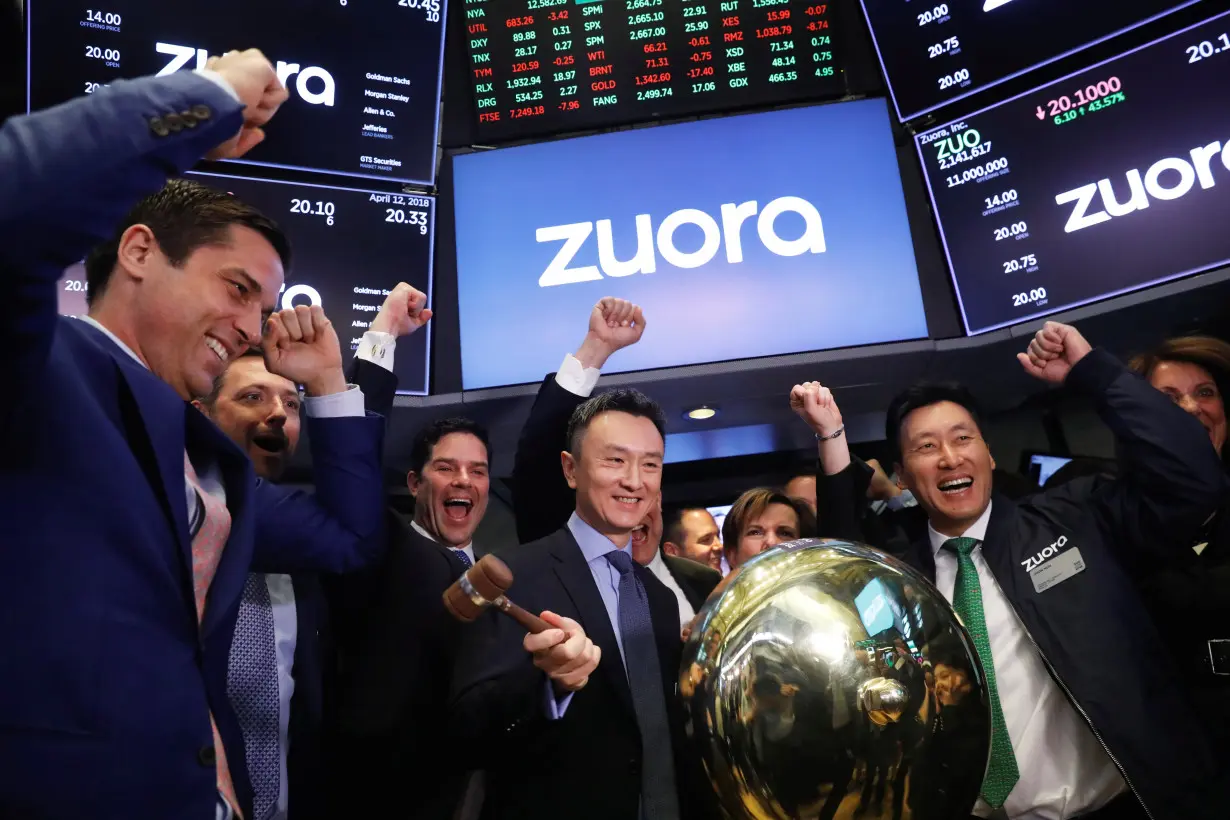 Founder and CEO of Zuora, Tien Tzuo, takes part in the company's IPO on the floor of the New York Stock Exchange shortly after the opening bell in New York