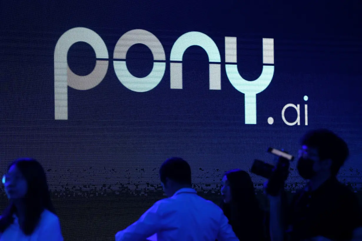 Logo of the autonomous driving technology startup Pony.ai is seen on a screen, in Beijing