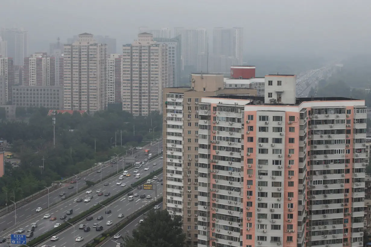 Residential buildings are seen along the Fourth Ring Road in Beijing