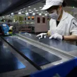 China September industrial output rises 5.4%, beating expectations