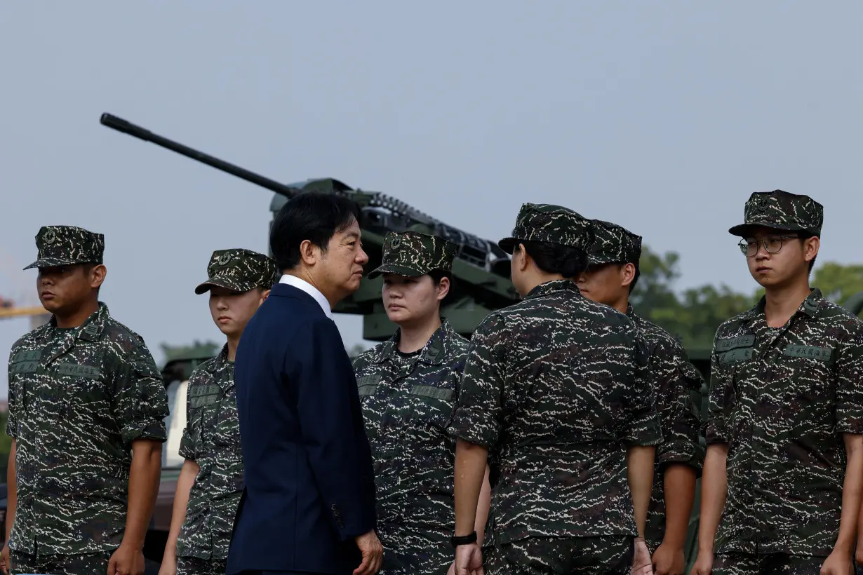 Taiwanese President Lai Ching-te visits a military base in response to recent Chinese military drills, in Taoyuan