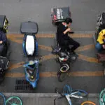 Hot meals, hot tempers: The struggles of China’s food delivery drivers