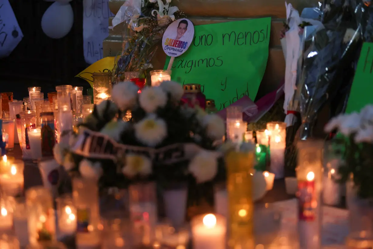 People attend a memorial after the killing of Alejandro Arcos, who had just taken office as the mayor of Chilpancingo, in Chilpancingo