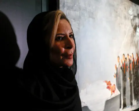 Moscow exhibits Gaddafi daughter's art, painted in slain Libyan leader's honour