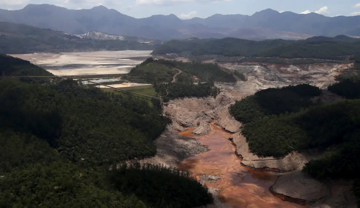 General view from above of a dam owned by Vale SA and BHP Billiton Ltd that burst, in Mariana