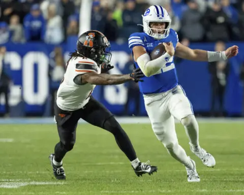 No. 13 BYU outlasts Oklahoma State to remain undefeated, winning 38-35 on TD with 10 seconds left