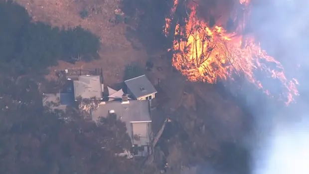 Fire burns hillside homes in Oakland amid day of high winds; residents evacuated