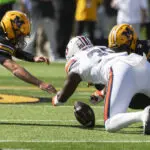 Brady Cook, hobbled by an injury, rallies No. 19 Mizzou to a 21-17 win over Auburn