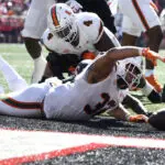 Cam Ward throws for 4 touchdowns, No. 6 Miami survives Louisville comeback bids for wild 52-45 win