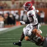 No. 5 Georgia knocks off No. 1 Texas 30-15, with Etienne running for 3 TDs