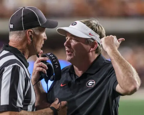 Texas apologizes to Georgia players, staff, SEC and game officials after fans throw trash on field