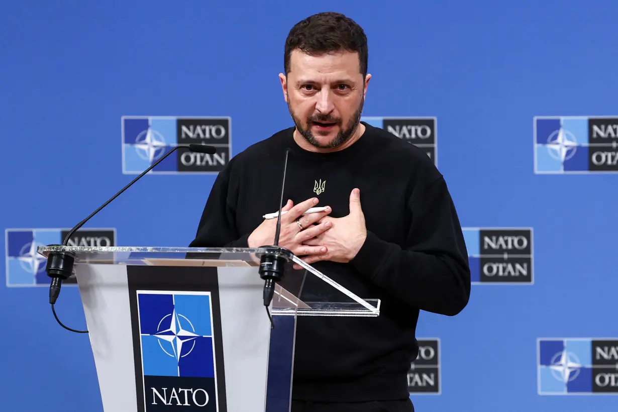 Ukraine's President Volodymyr Zelenskiy attends a press conference, in Brussels