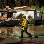 Calmer weather helps contain Oakland, California, fire that forced evacuations