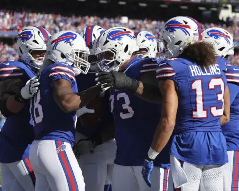 Cooper scores in his Bills debut and Allen shakes off a sluggish start in 34-10 rout of Titans