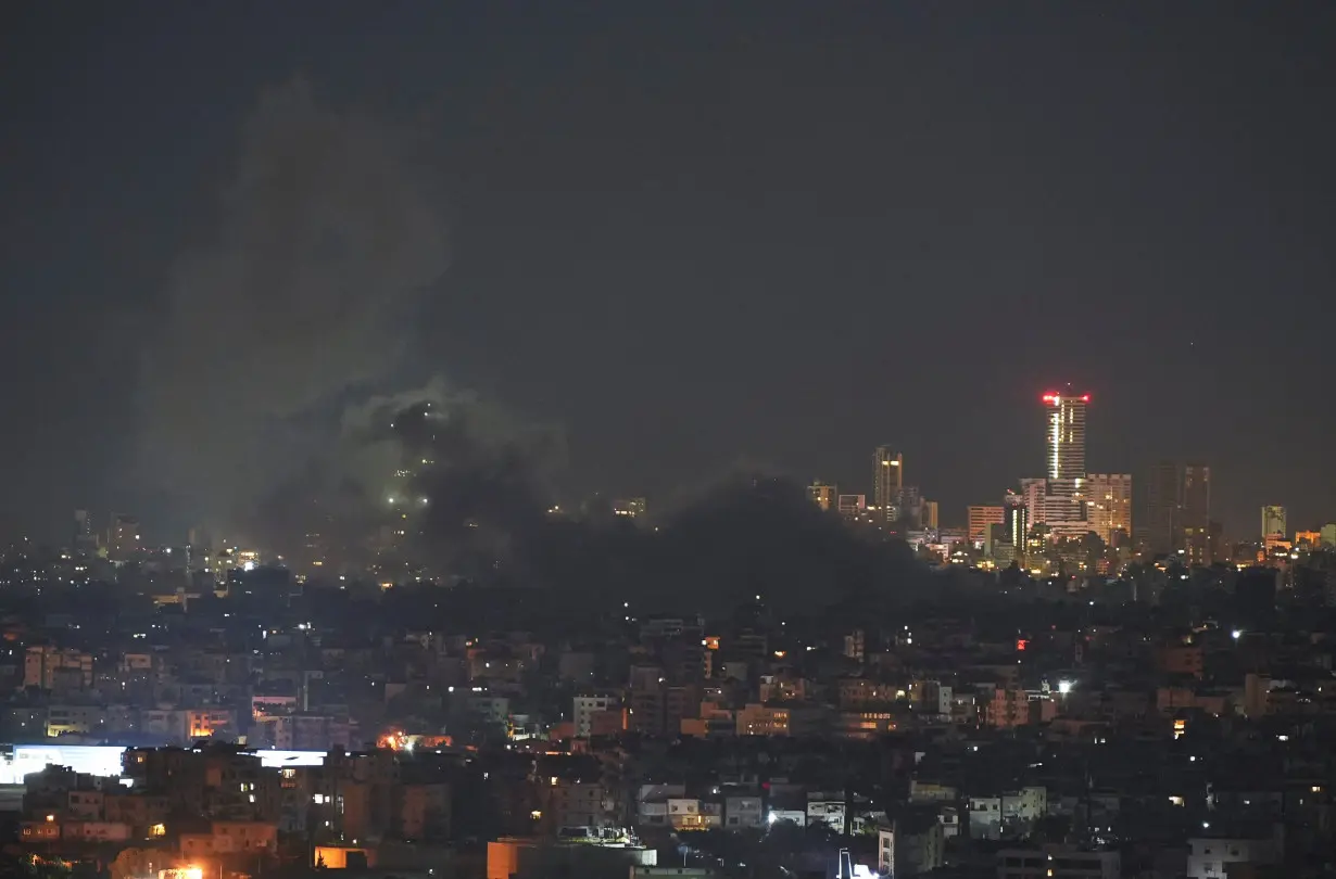 Aftermath of Israeli strikes on Beirut's southern suburbs, as seen from Deir Qoubel