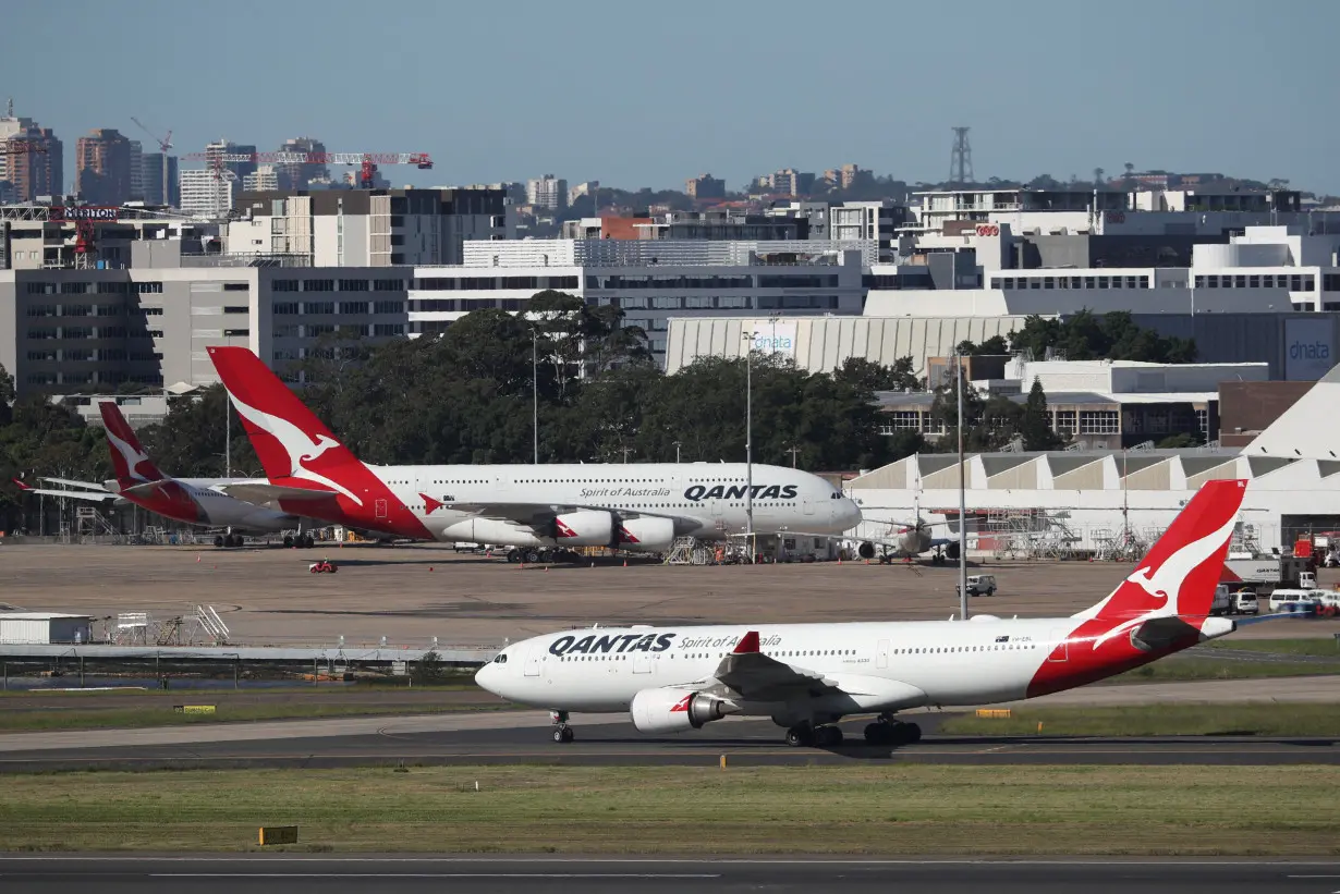 FILE PHOTO: Qantas planes are seen at Kingsford Smith International Airport in Sydney