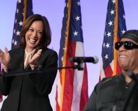 Harris urges Black churchgoers in Georgia to head out to vote and gets an assist from Stevie Wonder