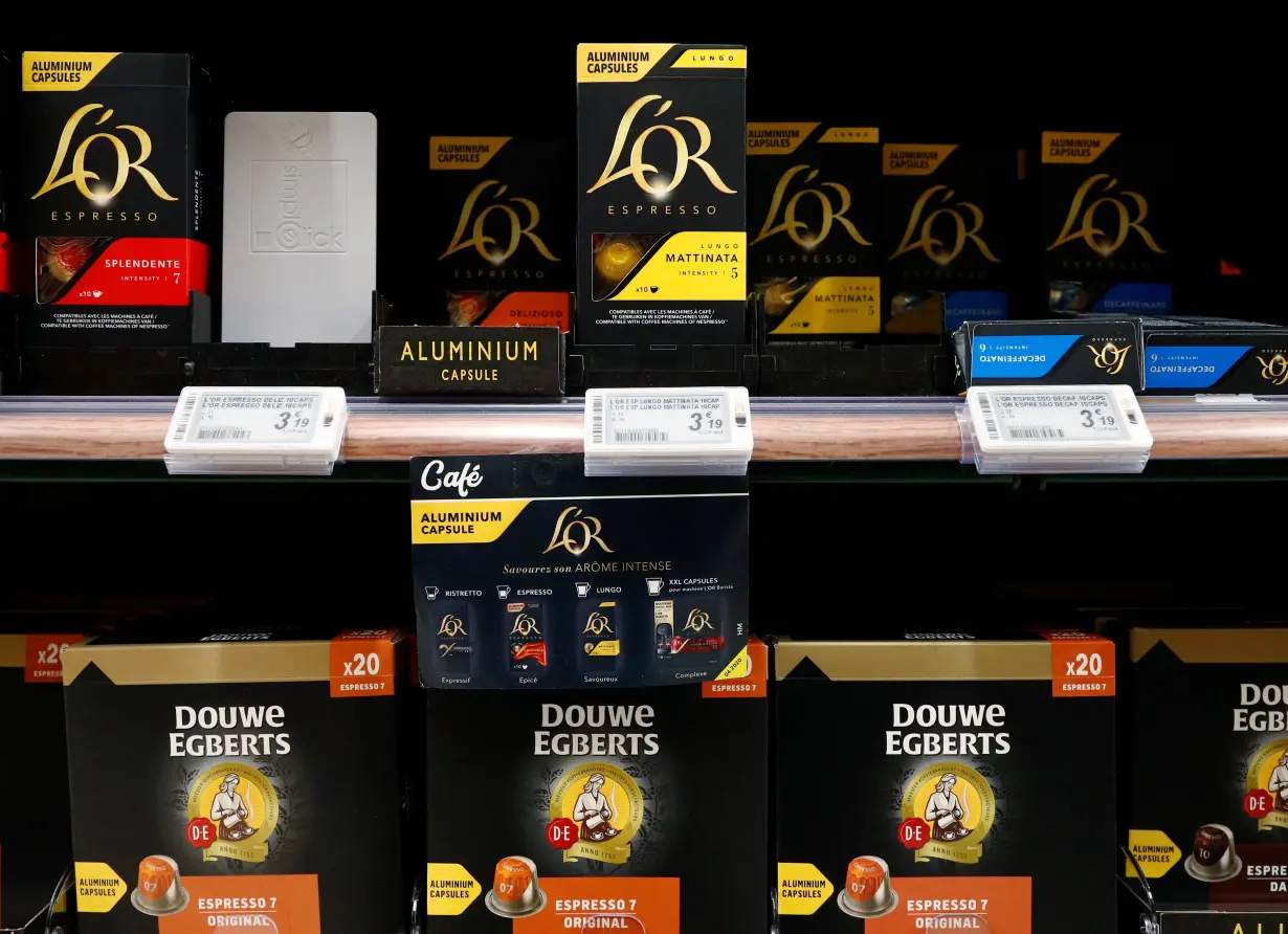 L'or and Douwe Egberts coffee packets are seen at a Carrefour supermarket in Brussels