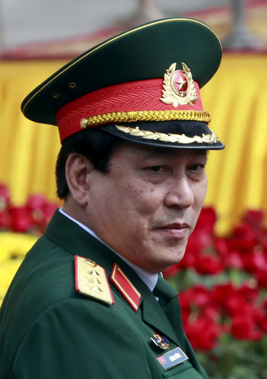 Luong Cuong is seen before a welcoming ceremony for Bounnhang Vorachit at the Presidential Palace in Hanoi