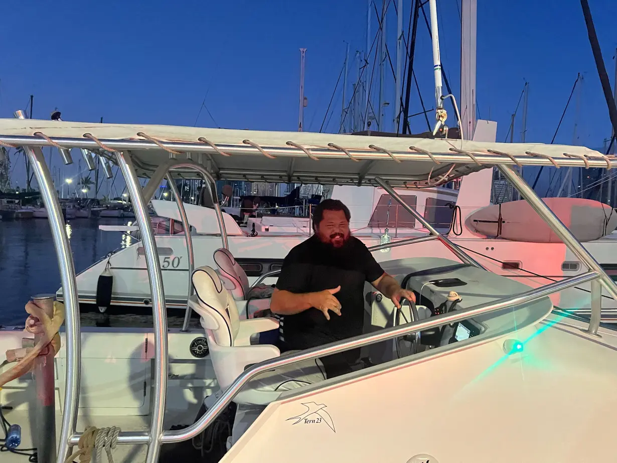 Noland Keaulana, who rescued Kahiau Kawai, is seen after dropping him off at the dock.