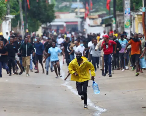 Mozambique police clash with opposition protesters after disputed election