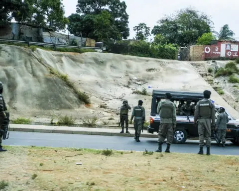 Police in Mozambique fire tear gas at opposition politician as post-election tensions soar