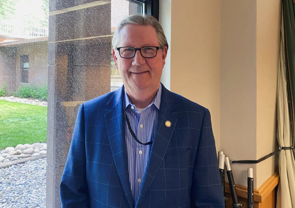 Federal Reserve Bank of Kansas City President Jeffrey Schmid poses at the Jackson Lake Lodge in Jackson Hole